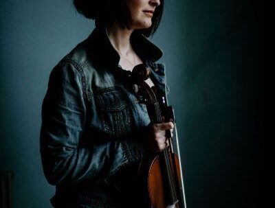 Niamh Dunne holding a violin 1