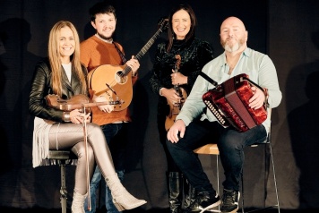 Photo of Derek Hicket Liz Yvonne Kane and Macdara Ó Faoláin against a plack background