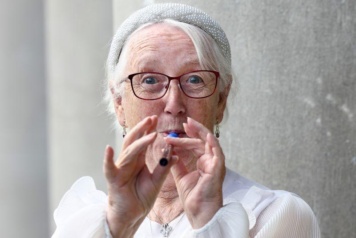 Never too old to learn - Liz Quinn plays the tin whistle at the launch of the Wicklow Teaching Residency, a partnership with Wicklow County Arts Office and Music Network. Photo by Marc O’Sullivan